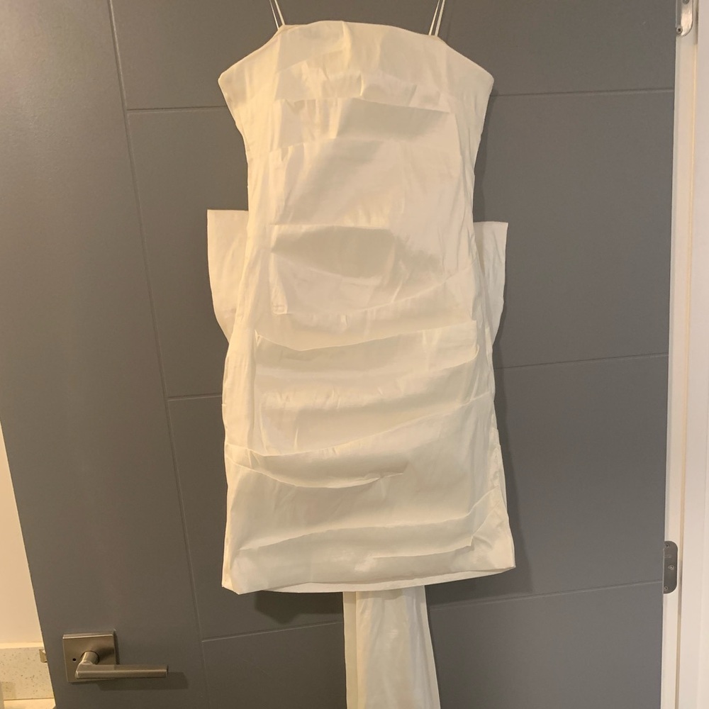 White dress with bow on the back
